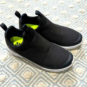 Puma black slip on golf shoes- only worn once!9 1/2